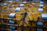 Packaging line with brioches being prepared for export, highlighting quality control.