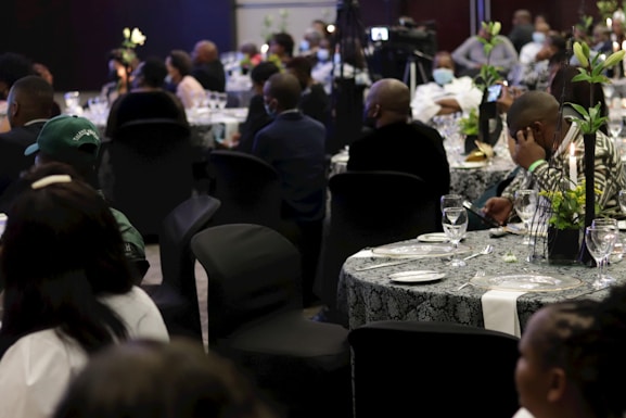 Corporate gala event featuring elegant decor and engaged attendees networking.