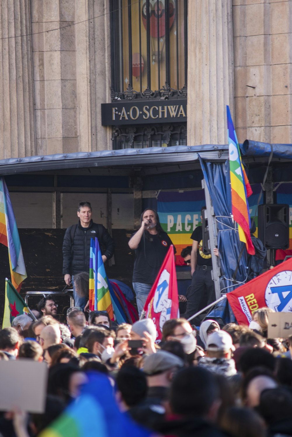 a group of people standing on top of a stage