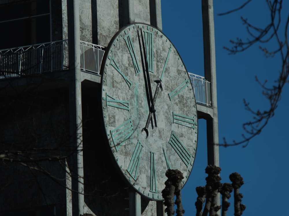 a large clock on the side of a building