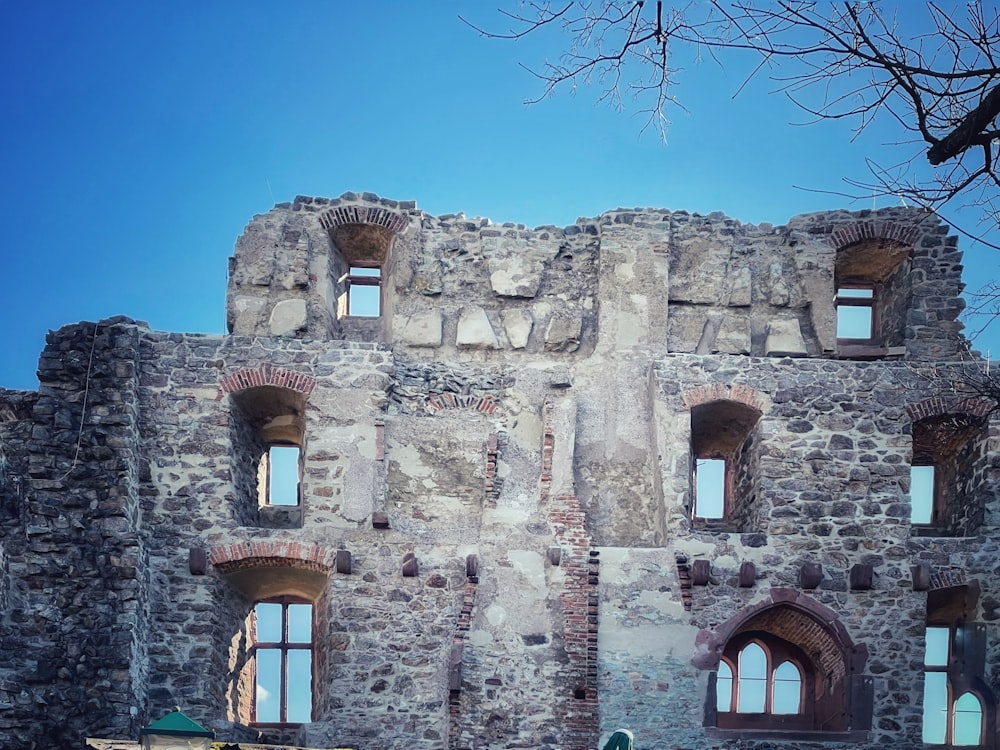 a large stone building with many windows