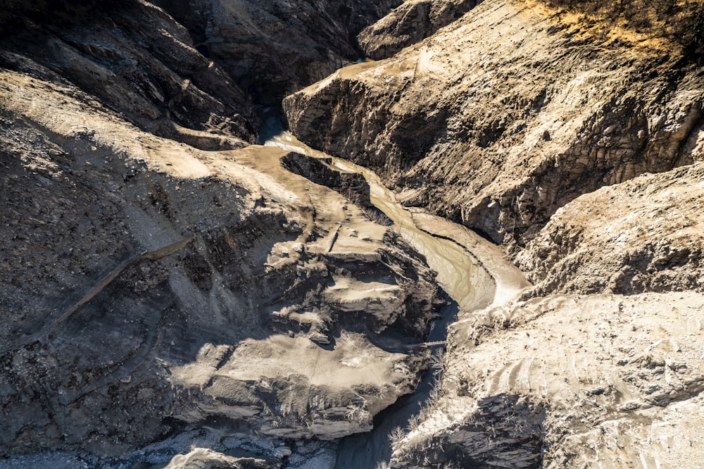 a view of a canyon with a river running through it