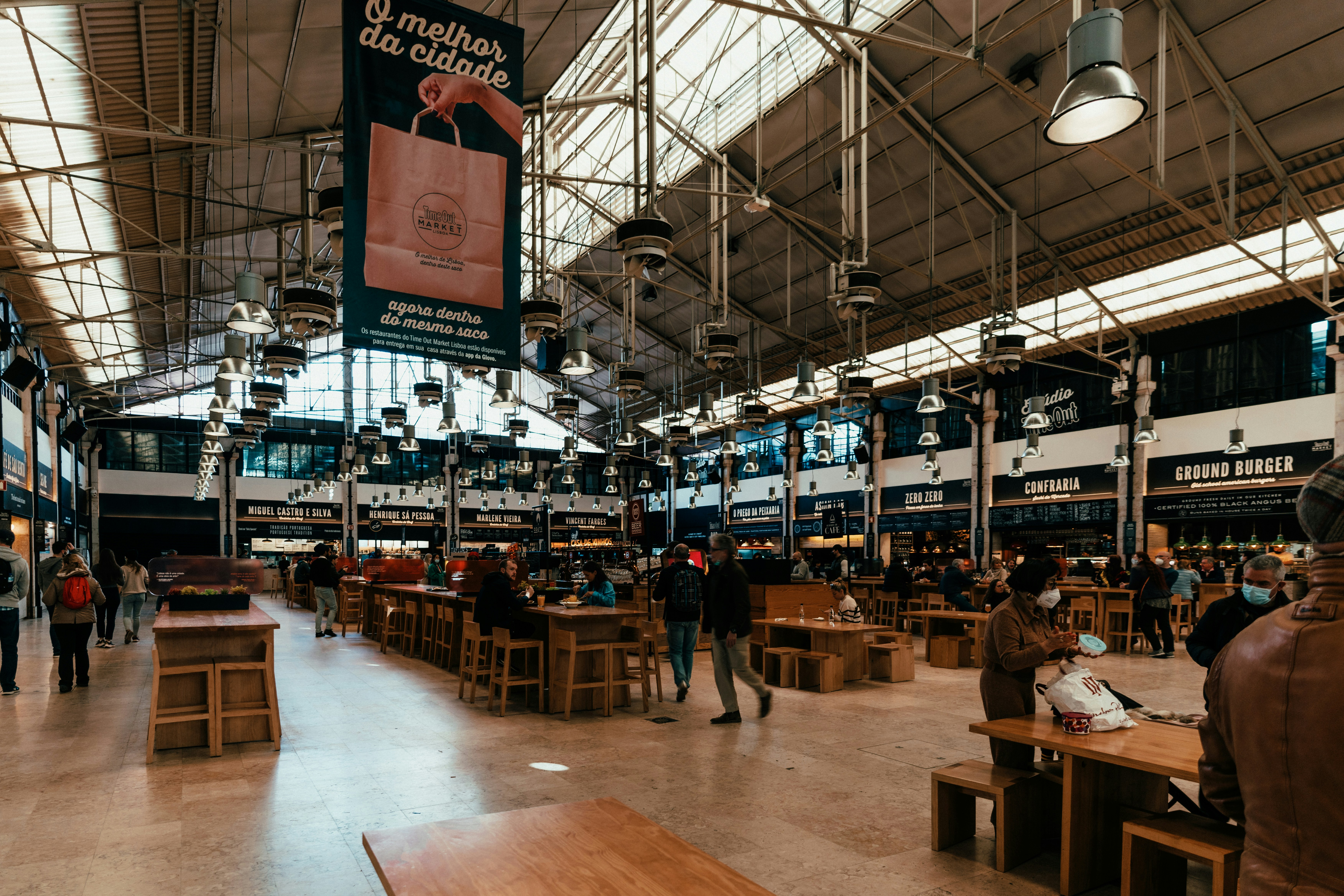 a group of people walking around a store, Foor market Time Out in Lisbon