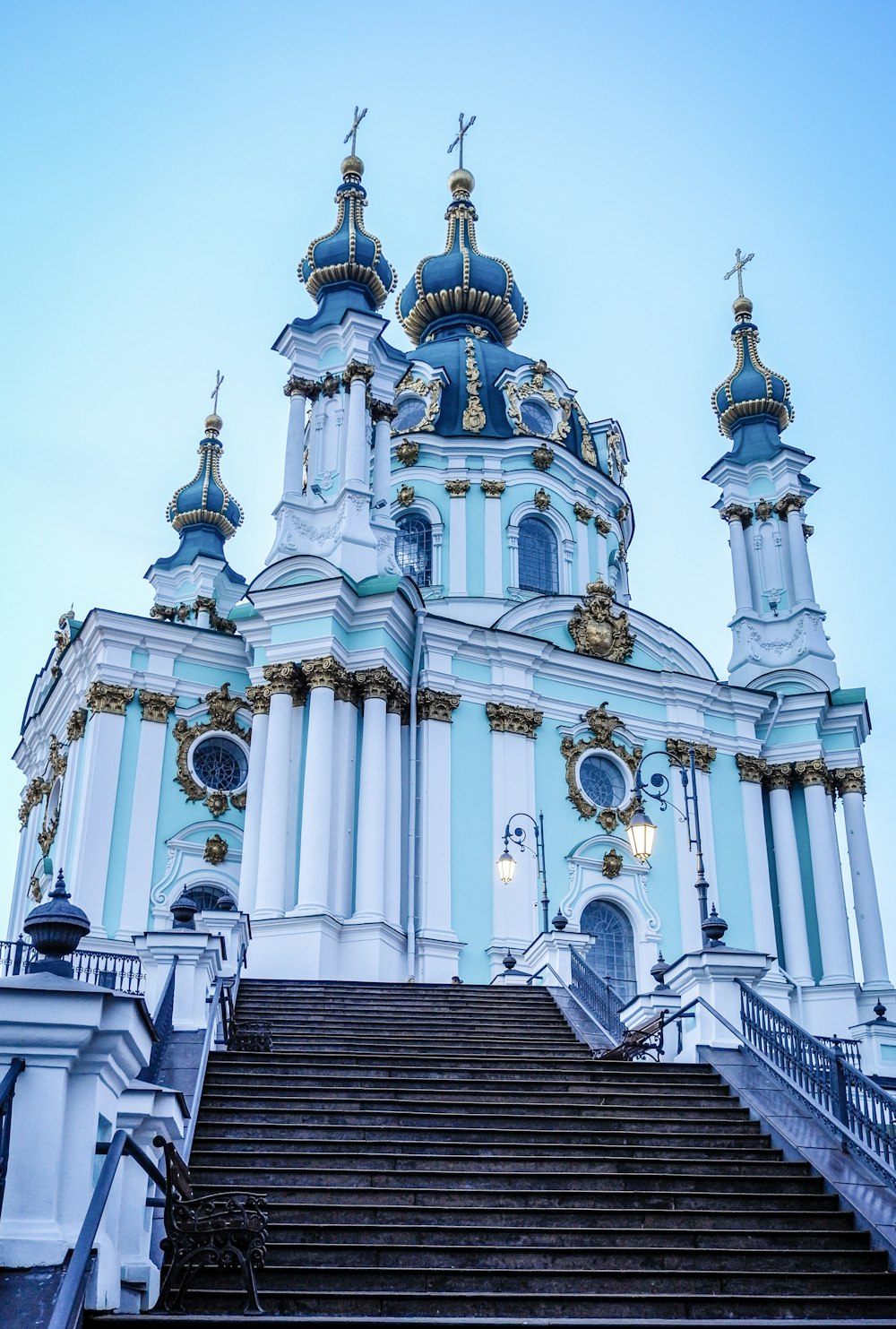 a large blue and white building with a steeple