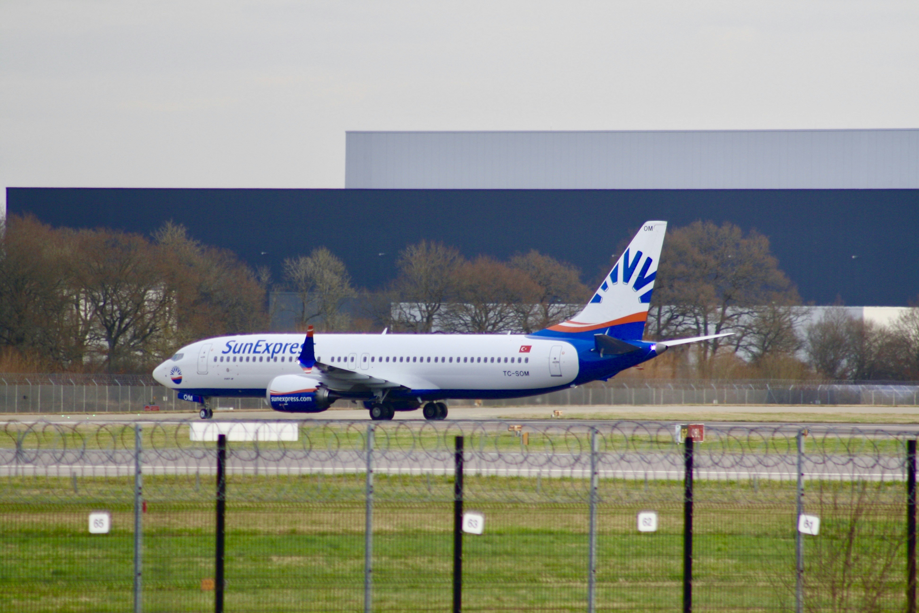 a large jetliner sitting on top of an airport runway