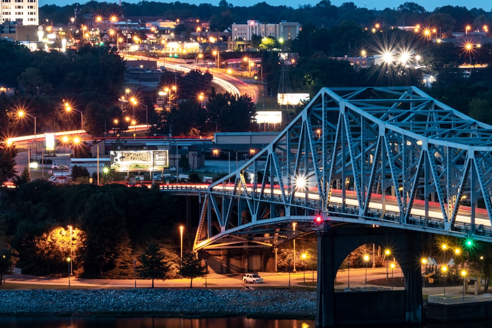 a bridge over a body of water at night