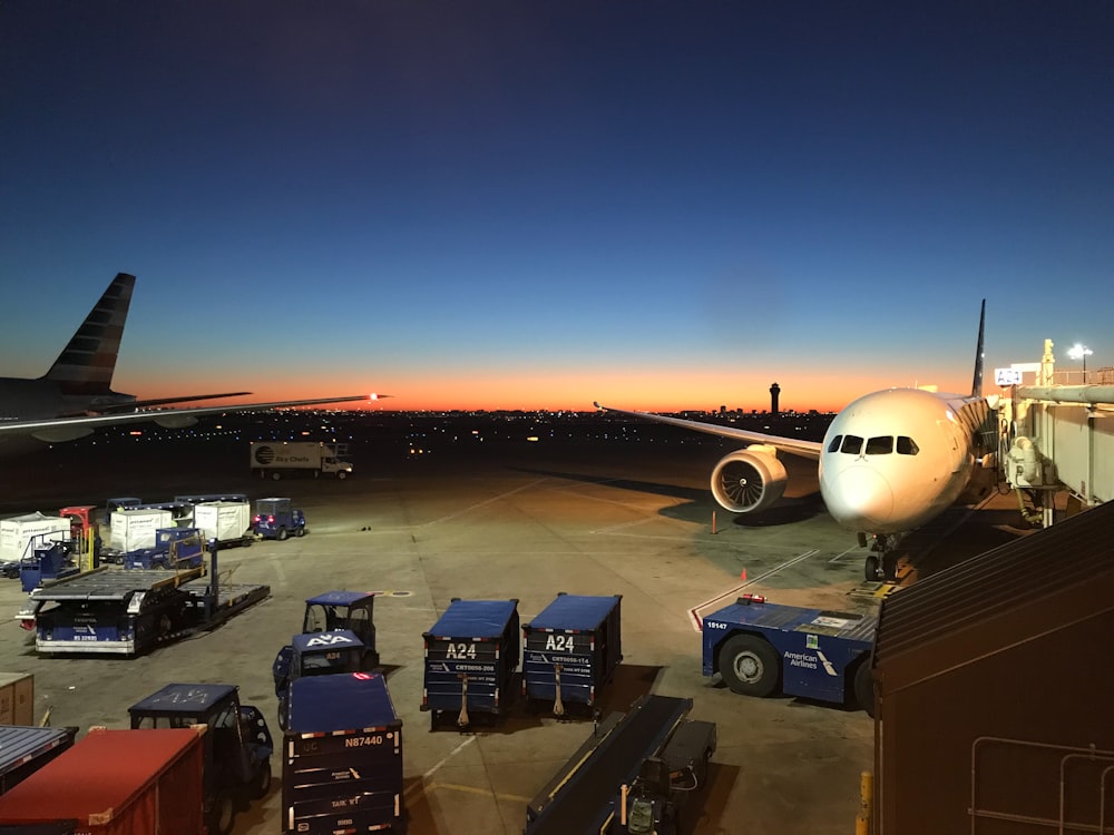 a large jetliner sitting on top of an airport tarmac