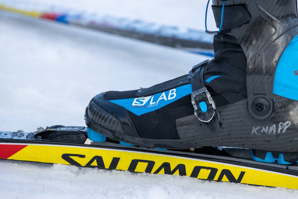 a pair of skis with ski poles attached to them