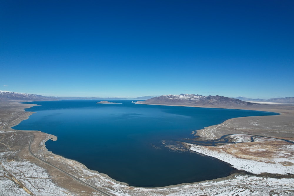 a large body of water surrounded by mountains