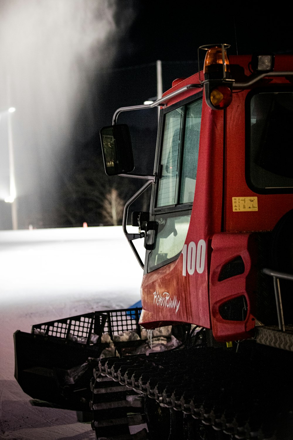 a snow plow is parked on the side of the road