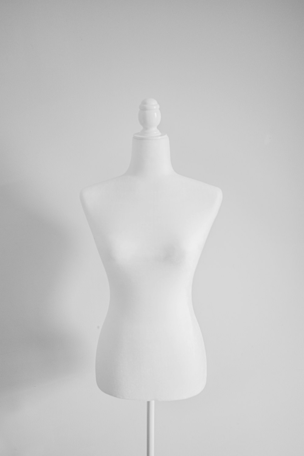 a white female mannequin on a white background