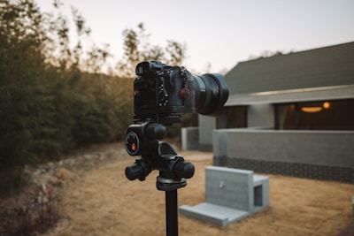 a video camera sitting on top of a tripod