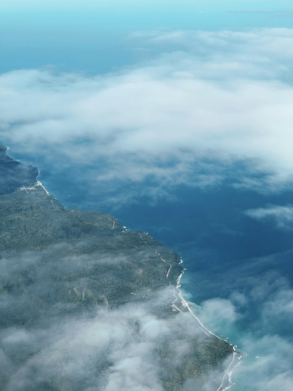 a view of the ocean from an airplane