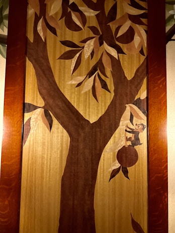 A stunning wooden wall art piece featuring nature-inspired designs.