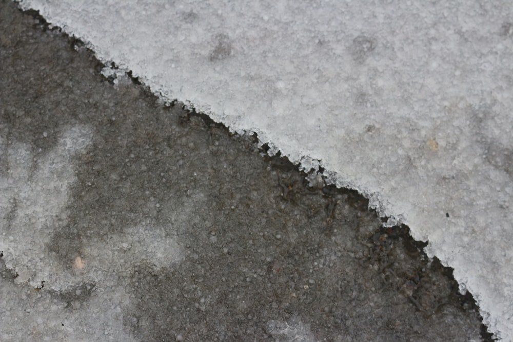 a close up of snow on the ground