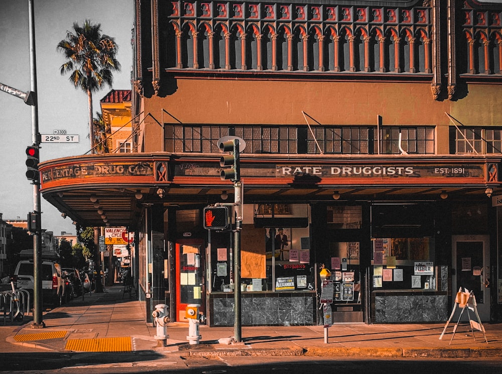 a street corner with a building and a traffic light