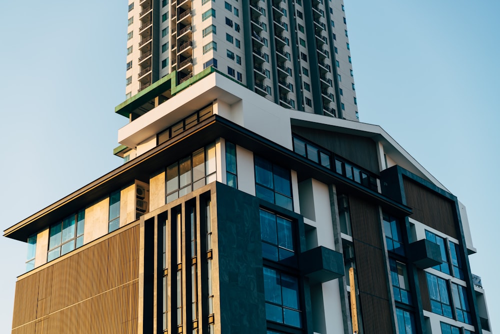 a tall building with a clock on the top of it