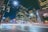 a city street at night with a lot of traffic