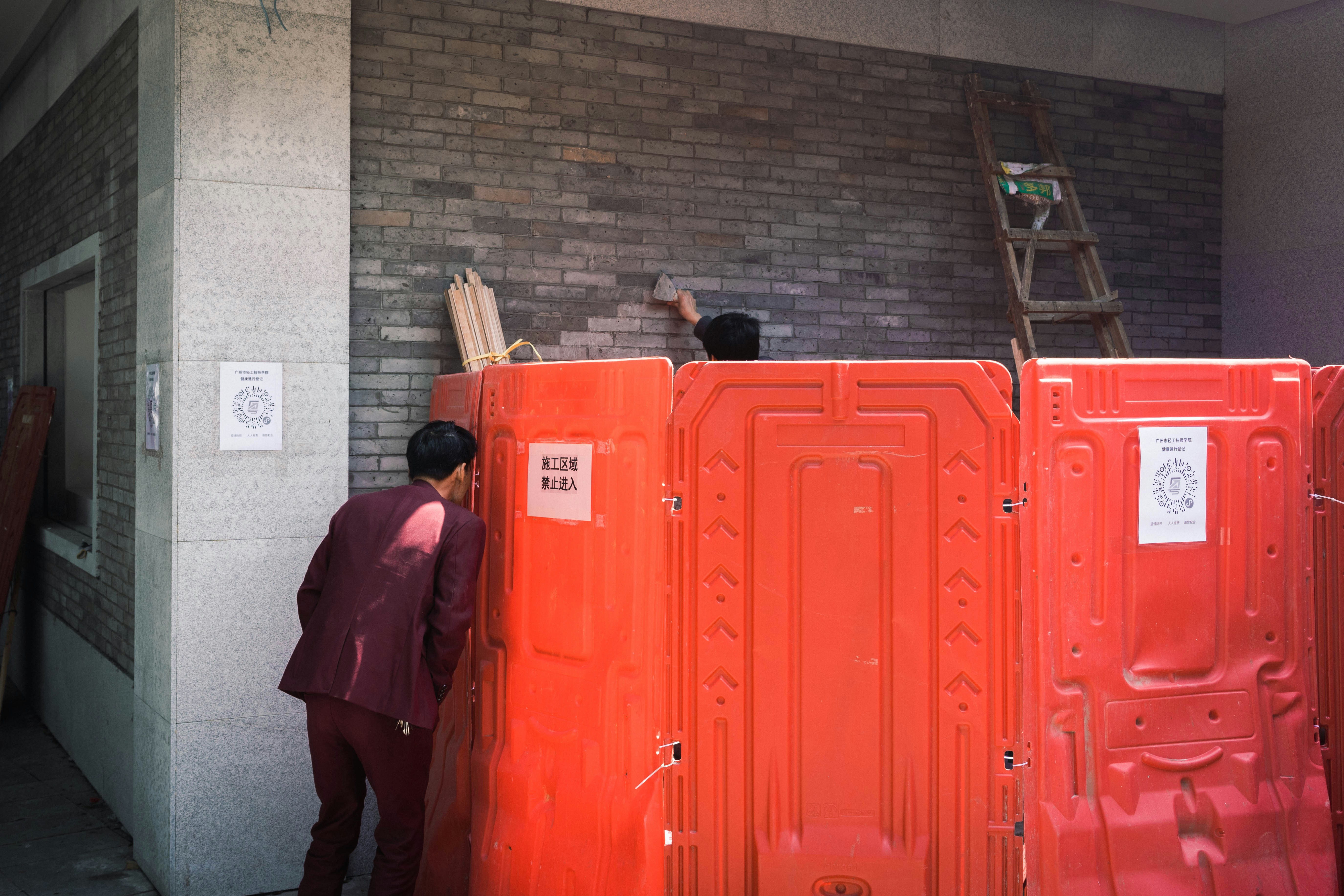 A high-durability portable restroom on a construction site - Industrial sanitation products