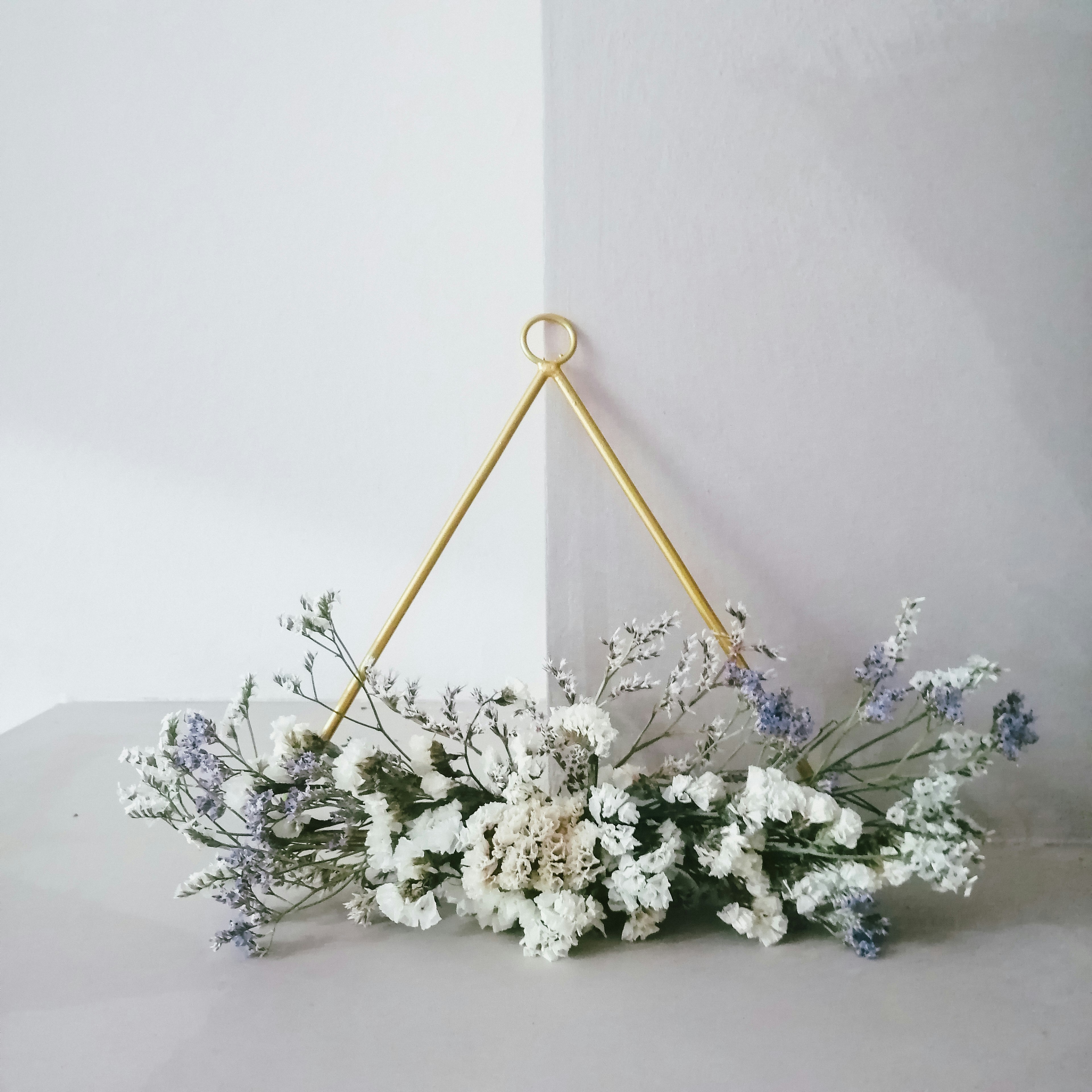 a bunch of flowers sitting on top of a table