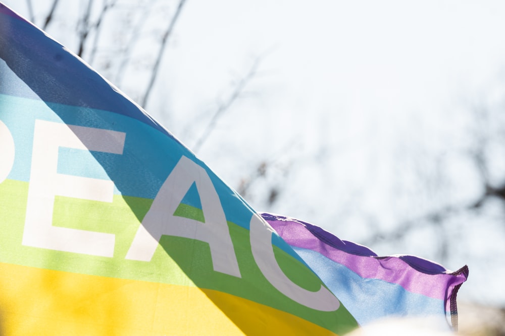 a flag with the word peace painted on it