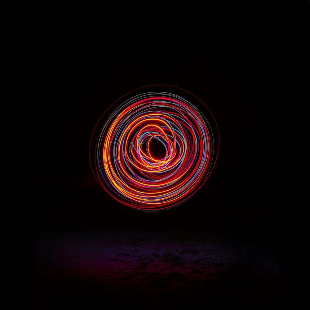 a circular light painting on a black background