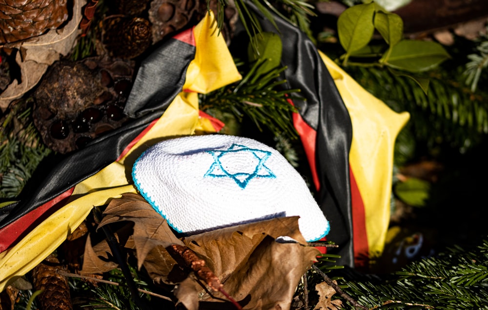 a jewish hat is laying on the ground