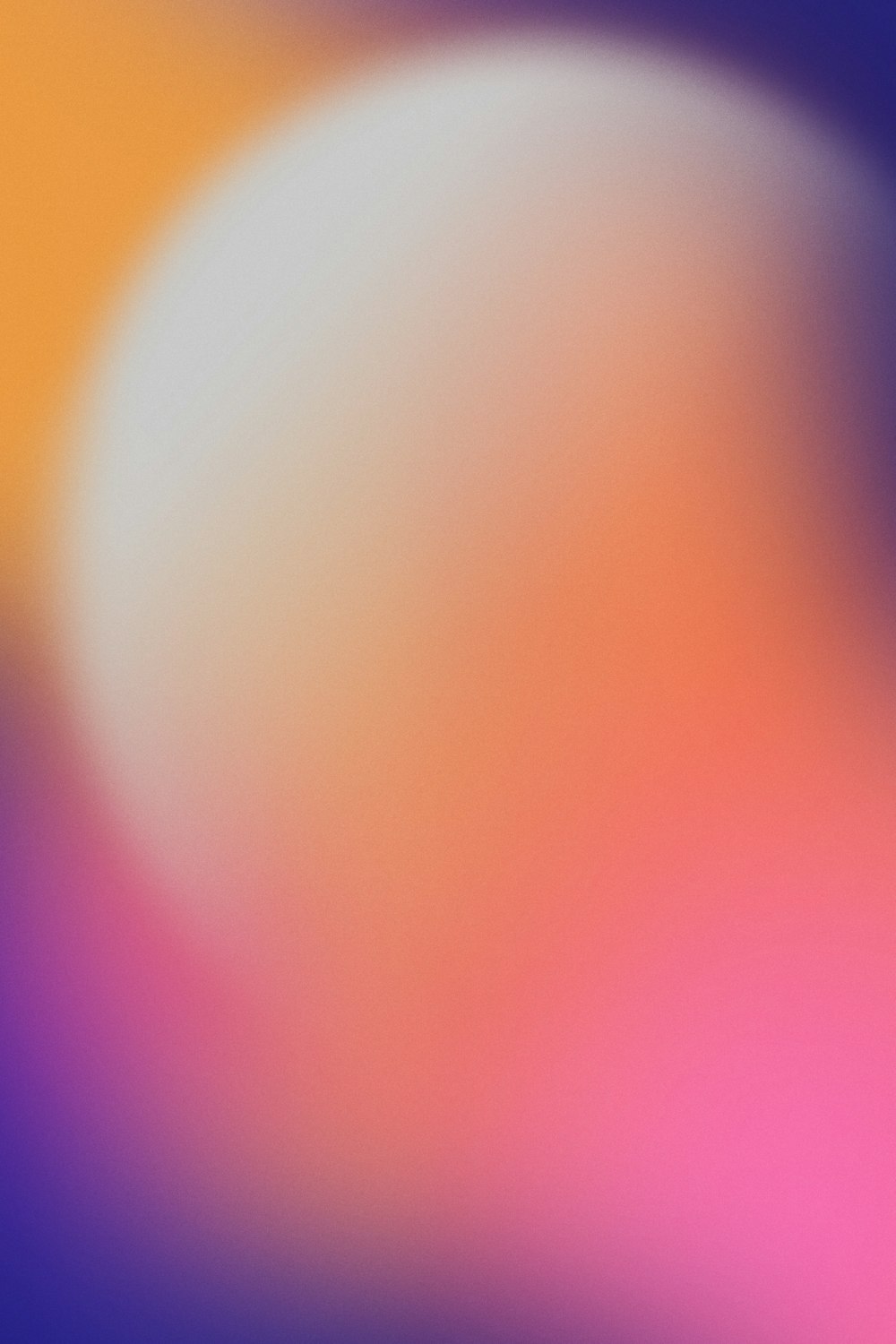 a blurry image of a purple and orange background