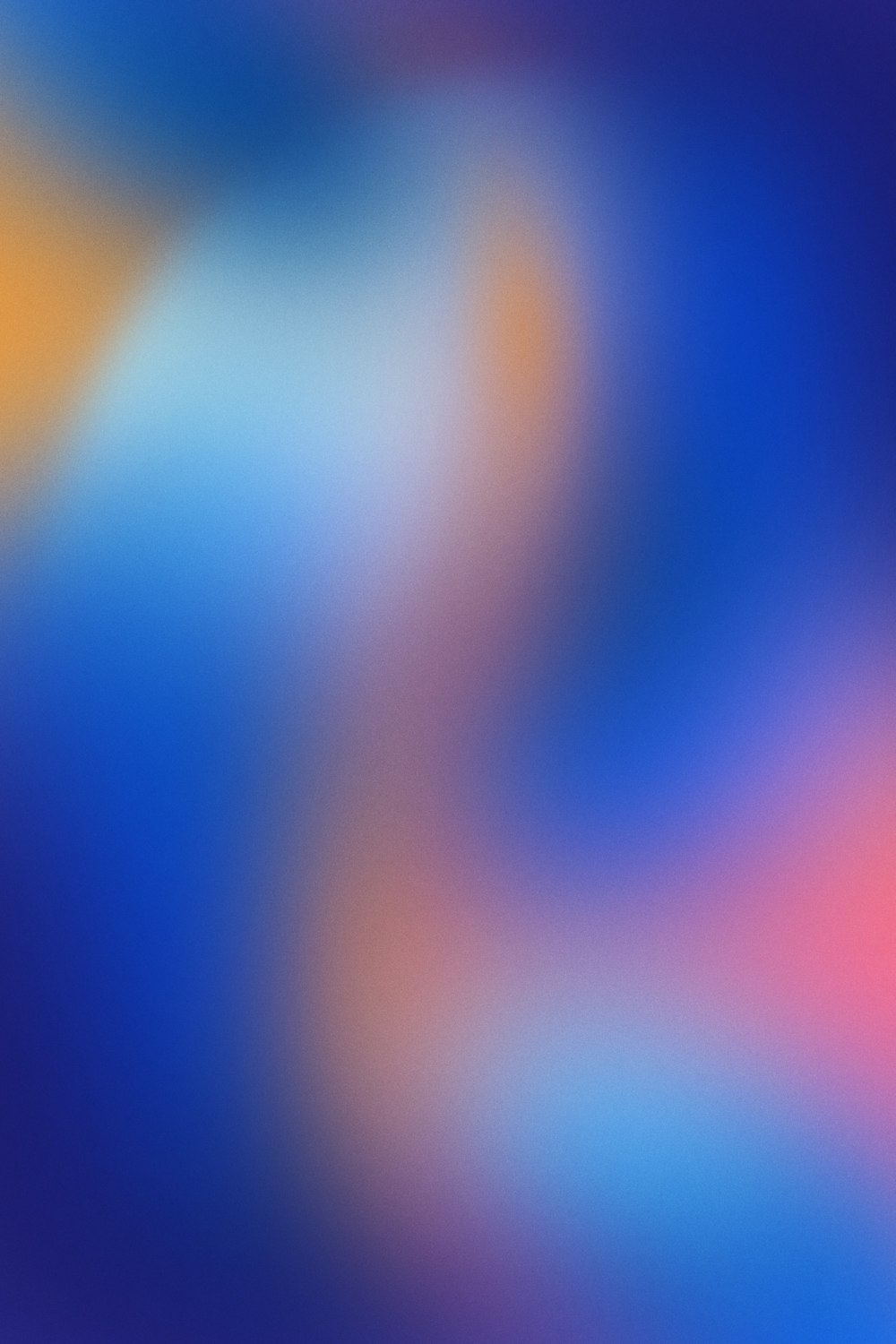 a blurry image of a blue and orange background
