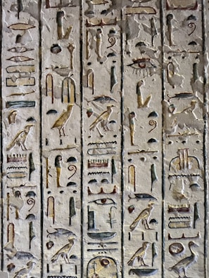 An intricate hieroglyphic inscription on a temple wall.