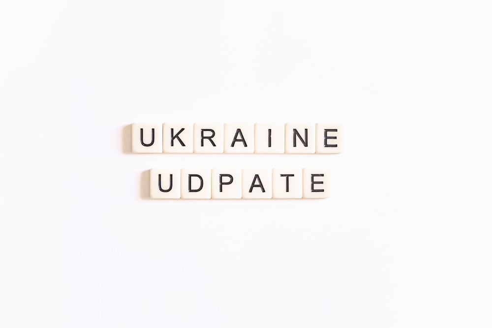 two scrabble tiles spelling ukraine and ukraine update