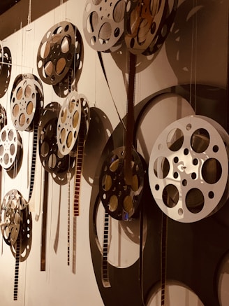 a bunch of clocks that are hanging on a wall