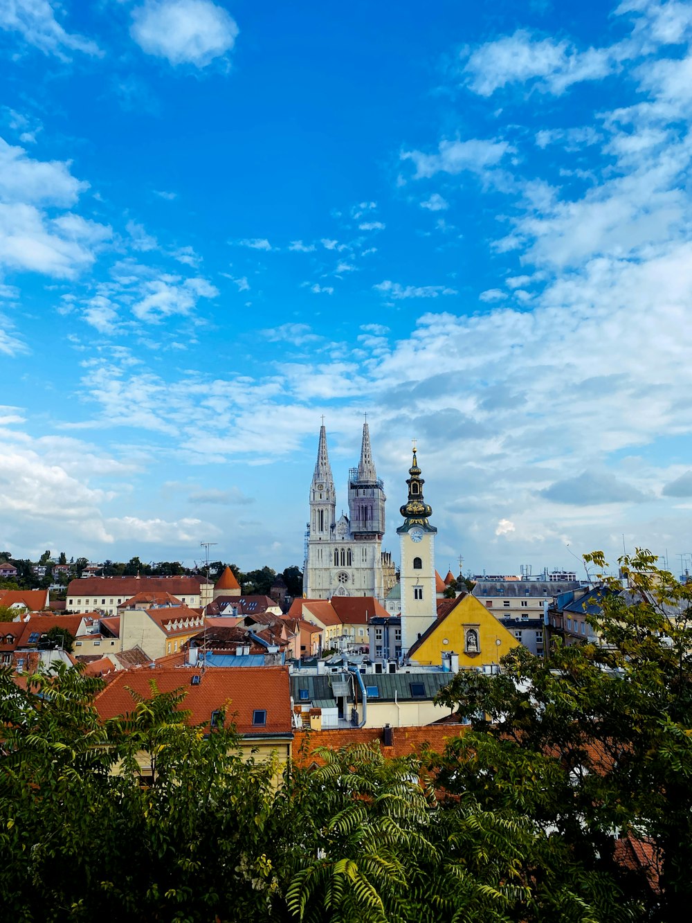 a view of a city from the top of a hill