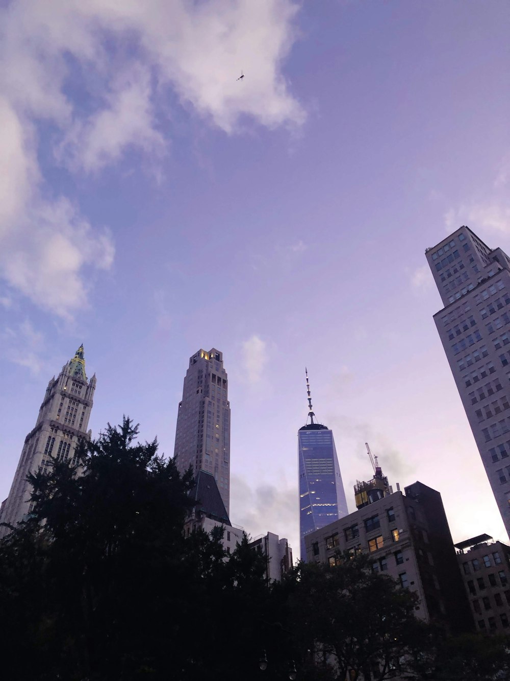 a group of tall buildings sitting next to each other