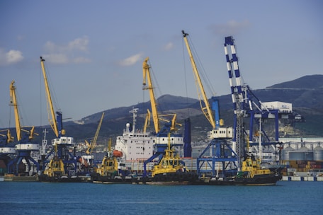 a group of boats that are sitting in the water