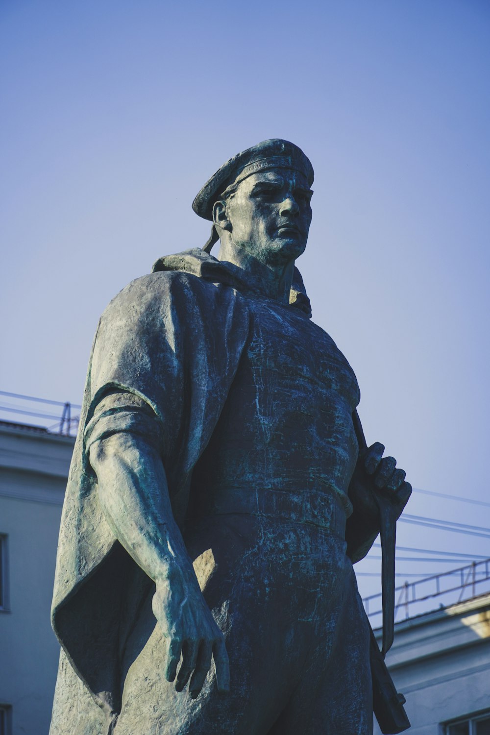 a statue of a man holding a baseball bat