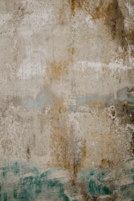 Close-up of a textured wall with earthy beige and olive green tones blending organically.