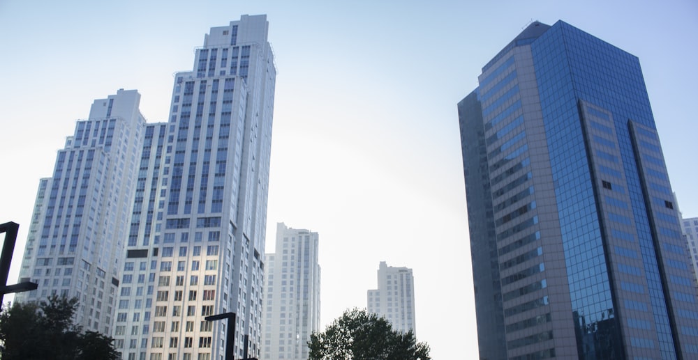 a group of tall buildings sitting next to each other