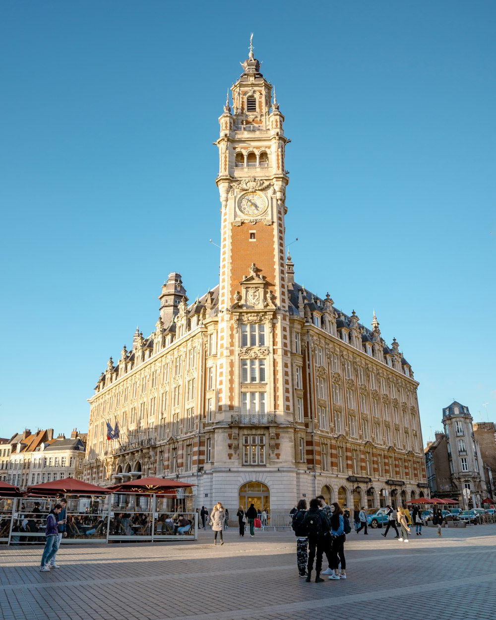 a tall building with a clock on the top of it