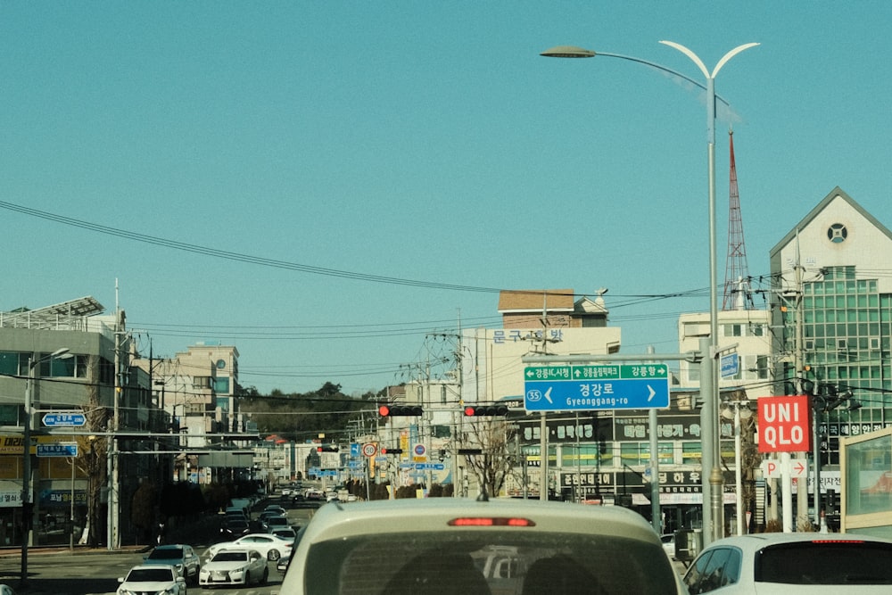 a city street filled with lots of traffic