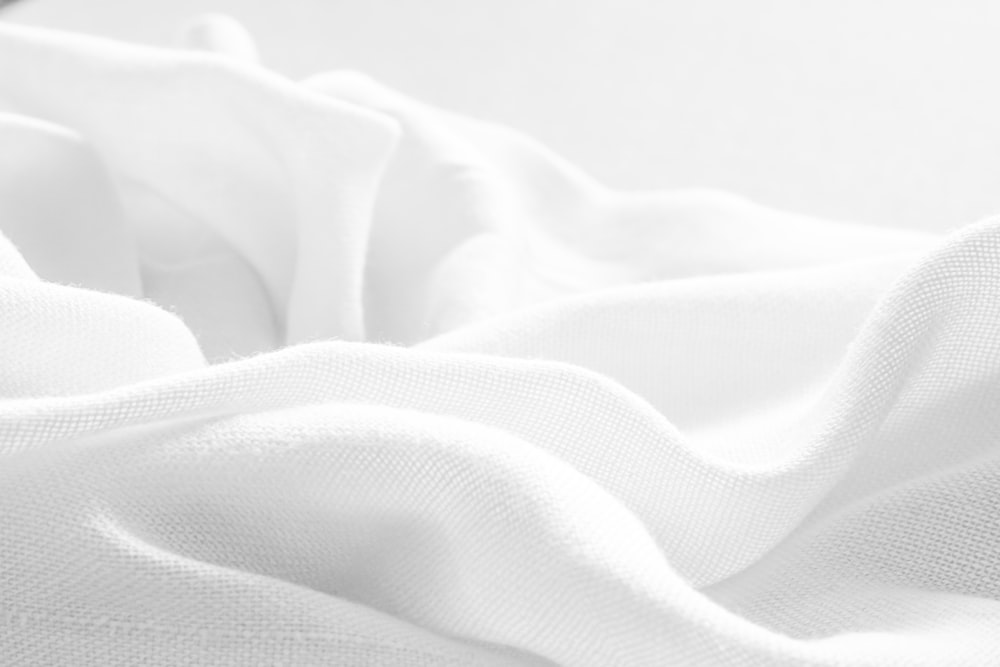 a black and white photo of a white cloth