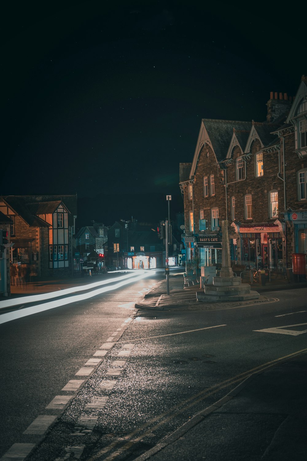 a street scene with focus on the side of a road