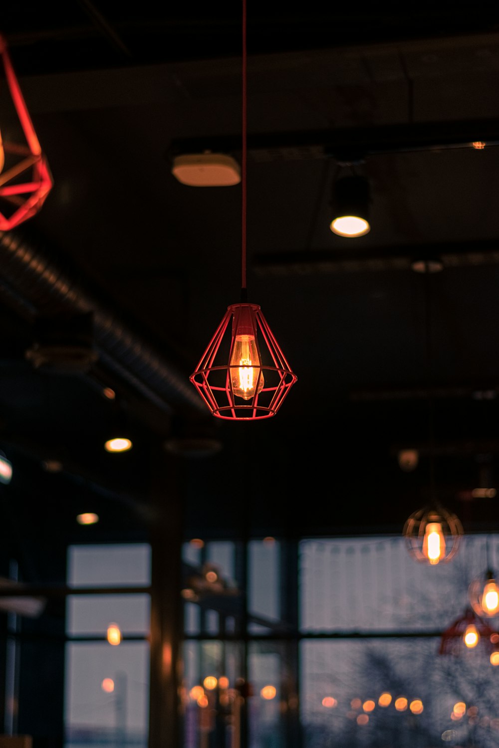 a group of lights hanging from a ceiling