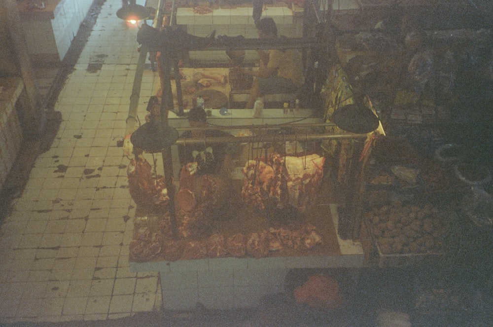 an overhead view of a butcher shop filled with meat