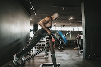 a man on a treadmill in a gym