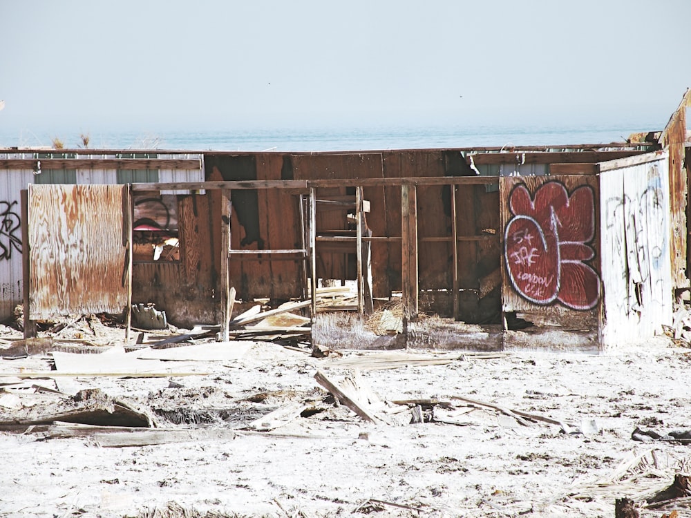 a run down building with graffiti on it