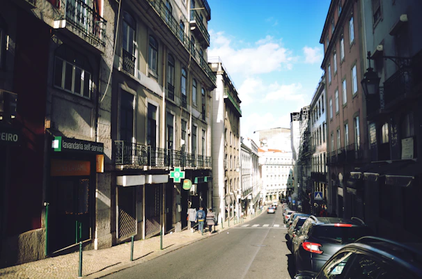 a city street filled with lots of tall buildings