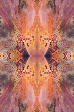 an abstract image of an orange and pink flower