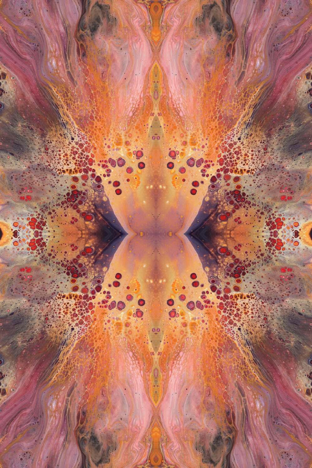 an abstract image of an orange and pink flower