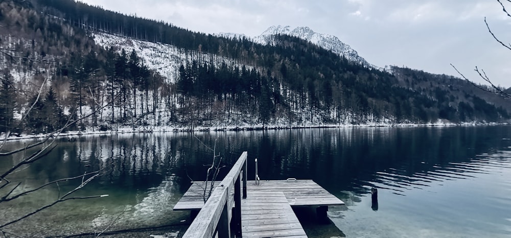 a wooden dock sitting next to a body of water